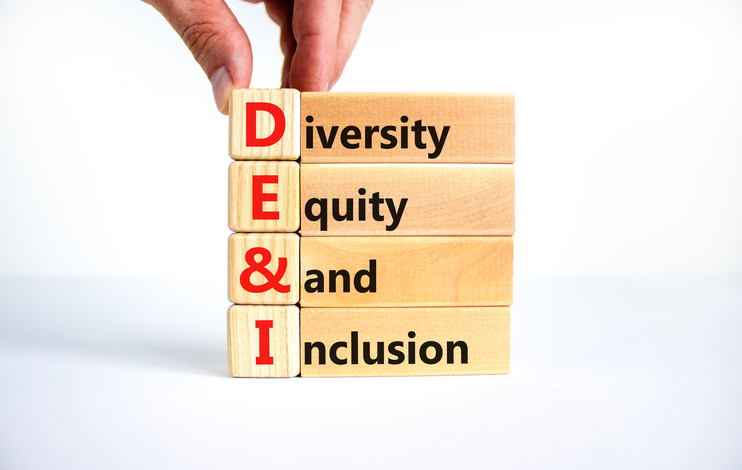DEI, Diversity, equity and inclusion symbol. Concept words DEI, diversity, equity and inclusion on wooden cubes on beautiful white background. Business, DEI, diversity, equity and inclusion